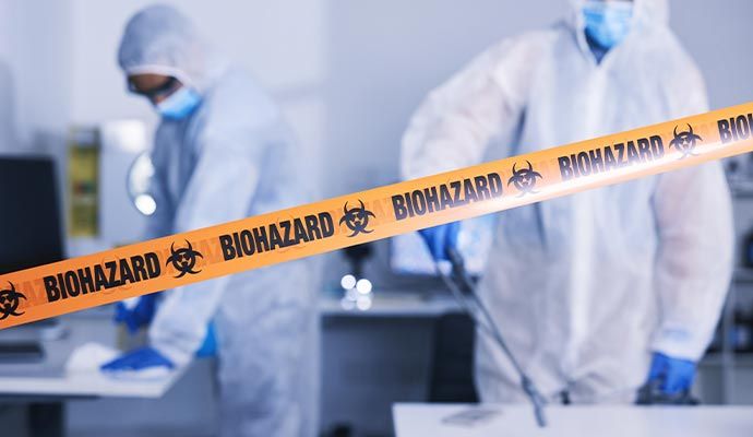 Emergency biohazard remediation service Professional team performing biohazard cleanup service