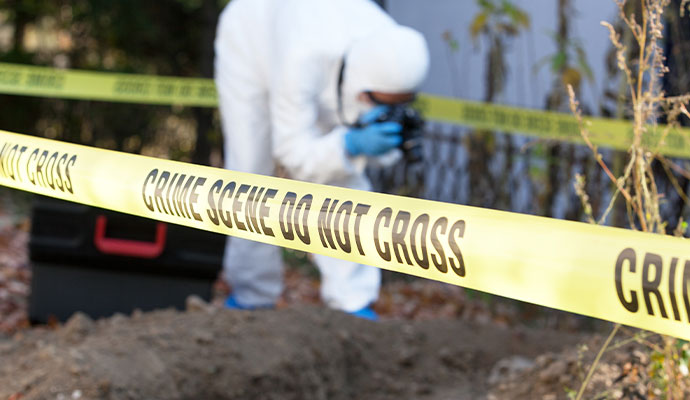 Well dressed worker cleaning trauma scene