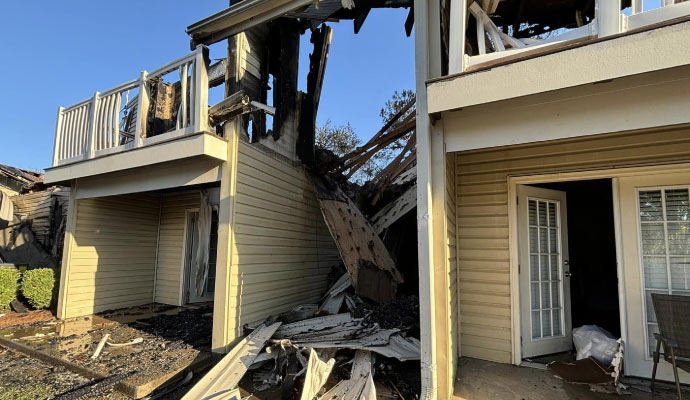 A burned house with smoke damage