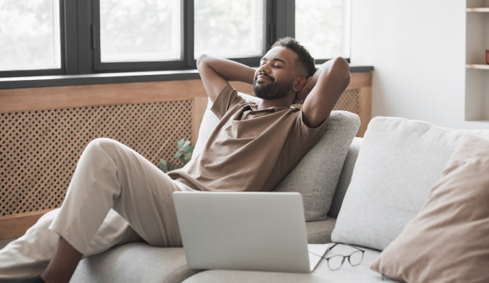 A man sitting on a sofa