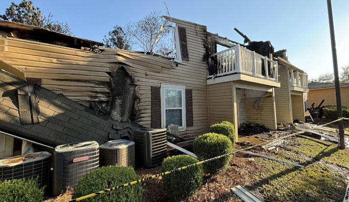 A severely fire-damaged house