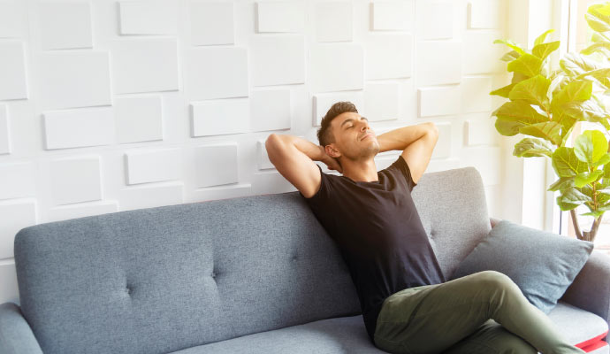 A person sitting in a clean and healthy room