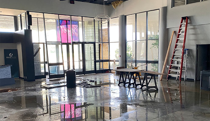 flooded lobby with construction materials