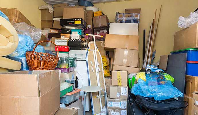 A cluttered storage room filled with various items