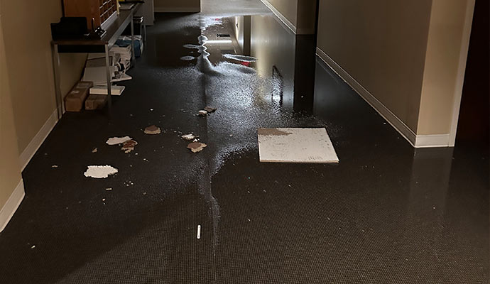 A corridor with a flooded floor