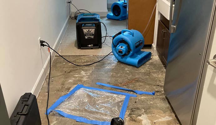 watere damage restoration equipment setup on the floor